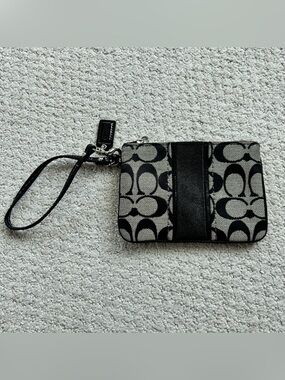 Coach Black and tan Signature Canvas Wristlet with Leather Strap